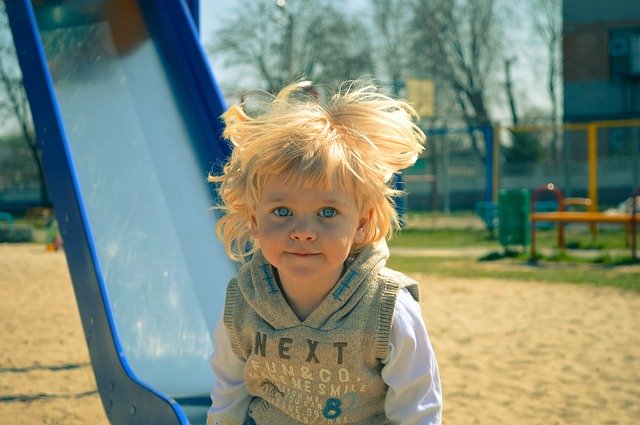 Blond Boy on Slide